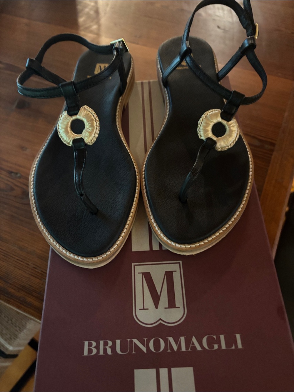 Bruno Magli Black Leather T-Strap Sandals with Gold Ring Detail